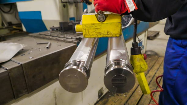 istock Two shiny metal pipes on a magnetic tool 1133761903