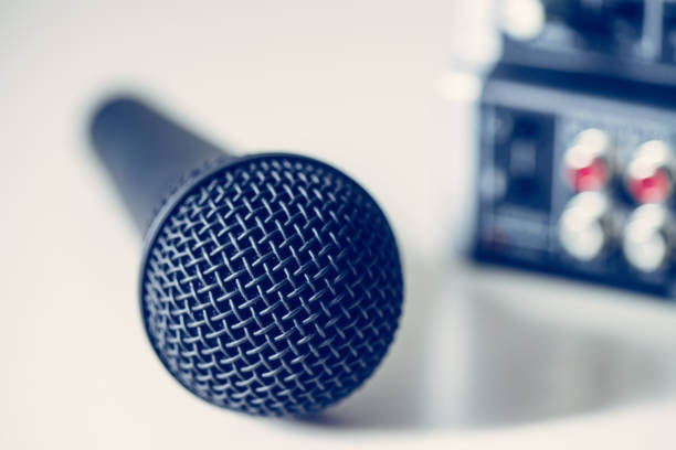 istock Black microphone and mixer in the blurry background 1133762394