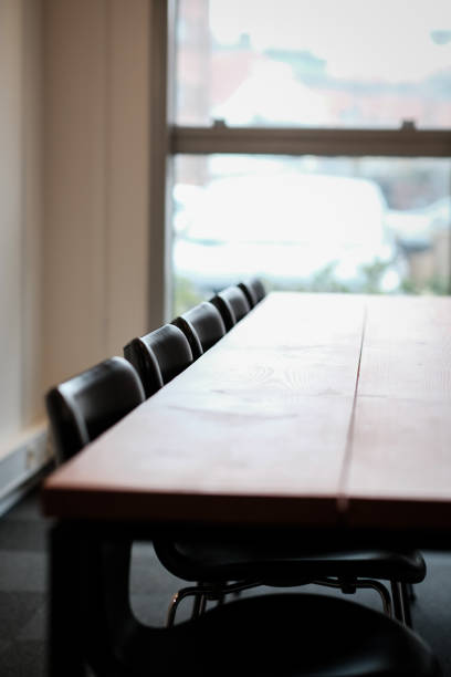 istock Conference room with a wooden table and designer chairs 1133762731