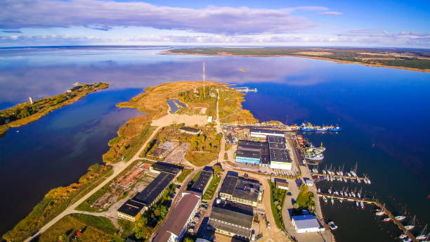 istock Industrial center with small boats on the river 1133764659