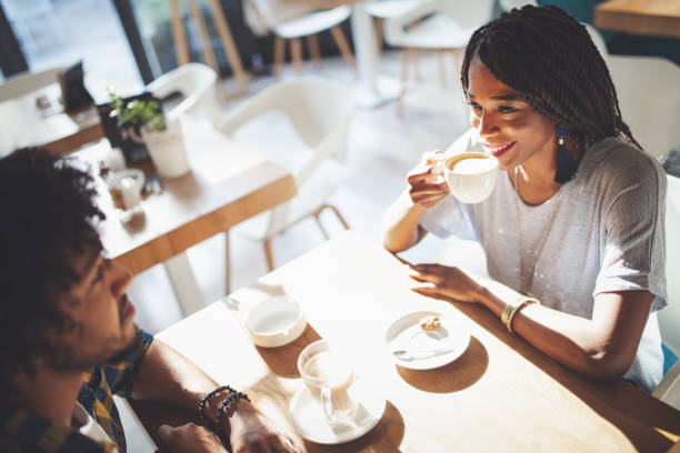 istock Laughing young couple in cafe, having a great time together 1133767181