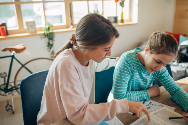istock Lady teacher and girl student on private class 1133767313