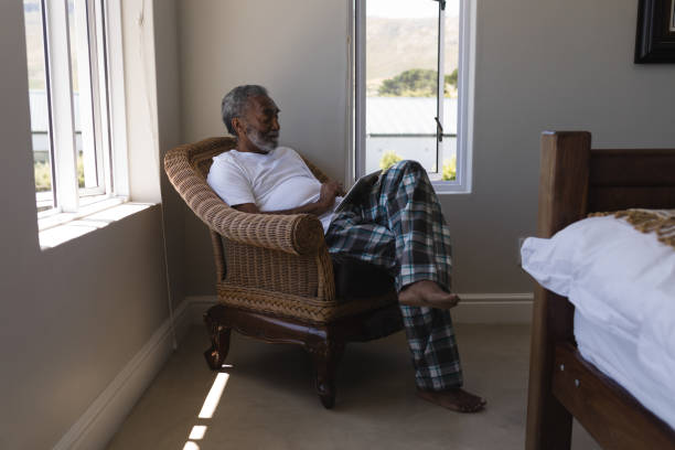 istock Senior man using digital tablet in bedroom at home 1133767529