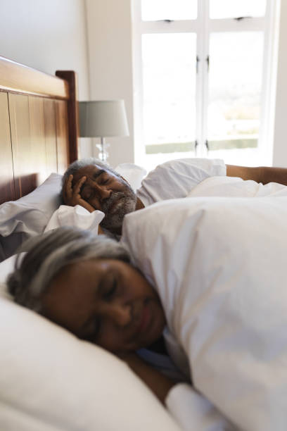 istock Senior couple sleeping in bedroom at home 1133767607