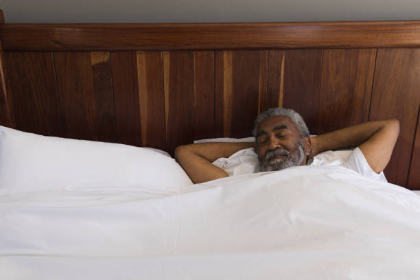 istock Senior man sleeping in bedroom at home 1133767651