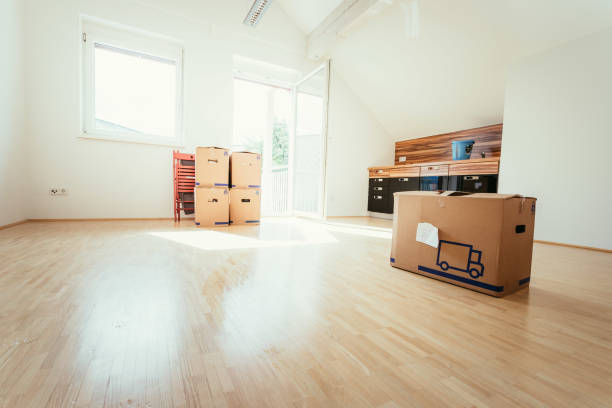istock Moving home: Cardboards in a clean and bright room. 1133769081