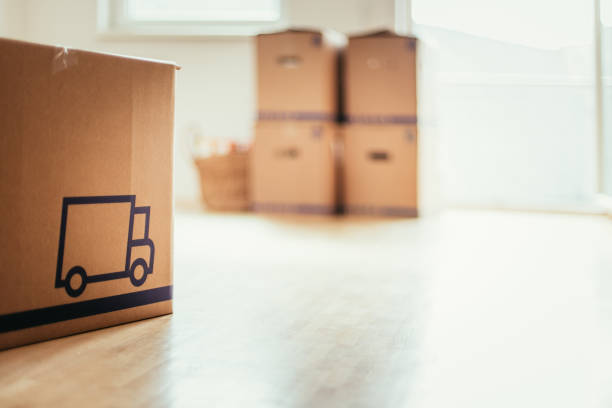 istock Move. Cardboard, boxes and stuff for moving into a new home 1133769159