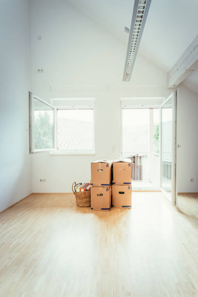 istock Move. Cardboard, boxes and stuff for moving into a new home 1133769177