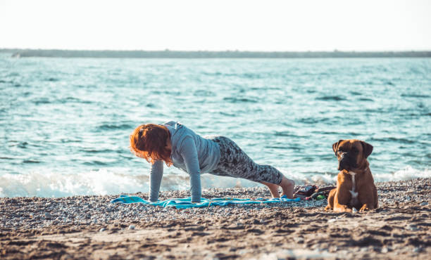 istock girl doing yoga 1133769390