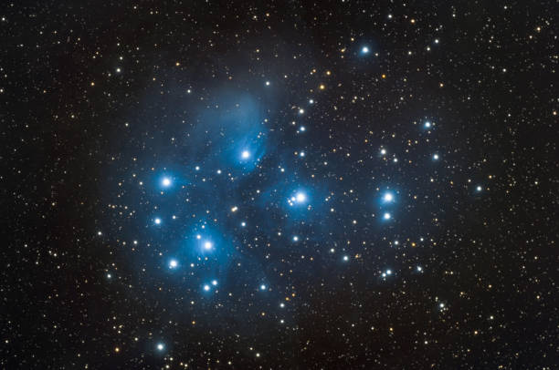 Messier 45 also nebula know as Pleiades Messier 45 nebula also know as Pleiades taken with dedicated astrophotography camera on the telescope the pleiades stock pictures, royalty-free photos & images