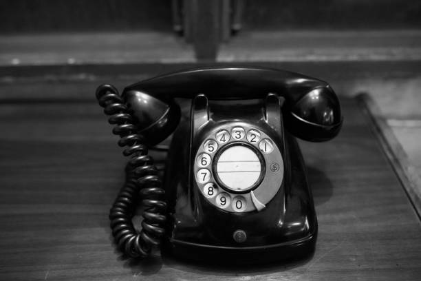 istock Vintage phone on a wooden table 1133775052