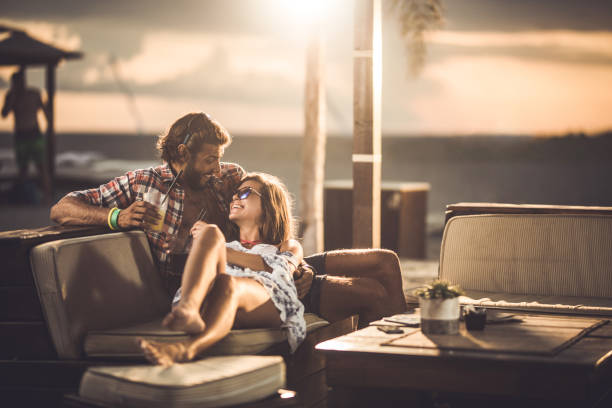 istock Happy couple enjoying  in a beach bar during summer day. 1133776241