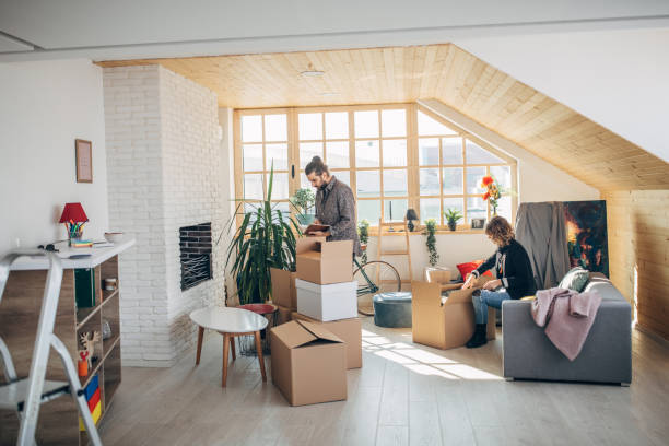 istock Boyfriend and girlfriend moving into a new apartment 1133777835