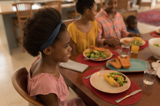 istock Family having meal together on dining table 1133779532