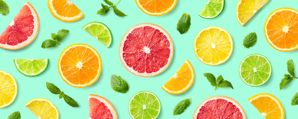 istock Colorful pattern of citrus fruit slices and mint leaves 1133780977
