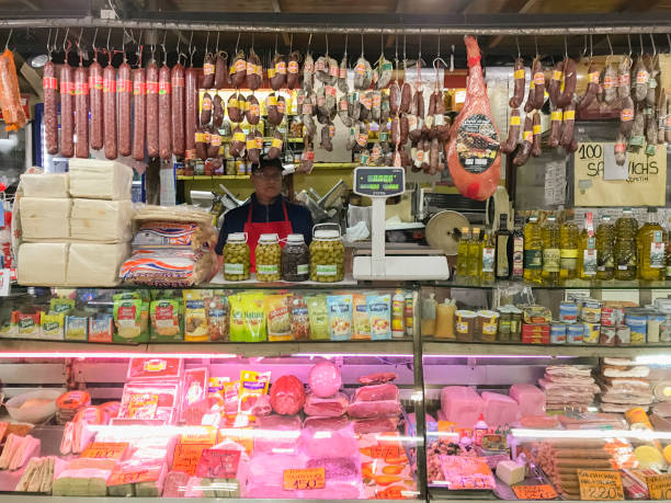 Mendoza, Argentina - February 5, 2019: Meat market Vendor at Central Market in Mendoza, Argentina.