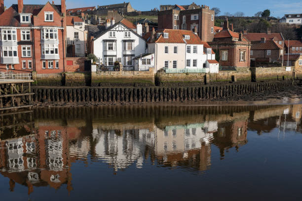 istock Reflections of homes and buildings in Whitby 1133781382