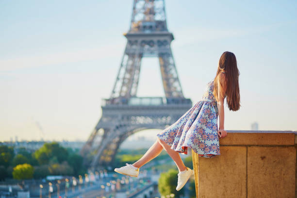 istock Young woman near the Eiffel tower 1133782211