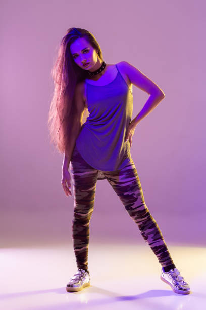 istock Modern style dancer posing on studio background. Hip hop, jazz funk, dancehall 1133782601