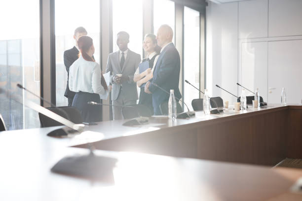 istock Business People in Sunlit Office 1133783095