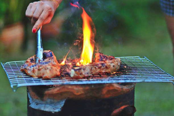 istock Grilling meat in a traditional grill 1133783294