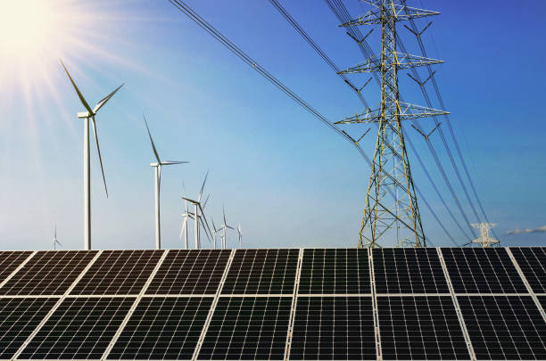 istock solar panel with wind turebine and electricity high voltage . concept clean energy 1133783901