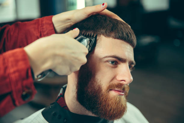 istock Client during beard shaving in barber shop 1133787048