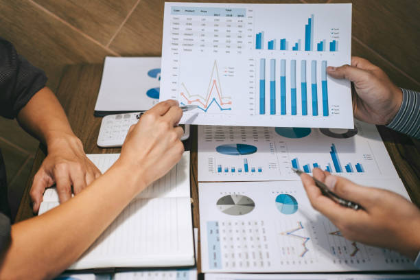istock Business team two colleagues making conversation with partner presentation project at meeting working and analyzing, Idea presentation and strategy plan of business investment 1133788420