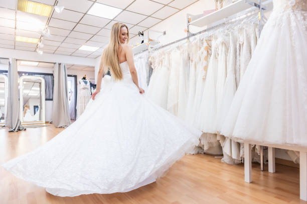 istock Playful bride in bridal shop 1133788763