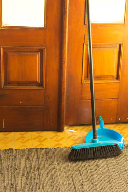 istock Blue Broom and Dustpan in Home Interior 1133789121