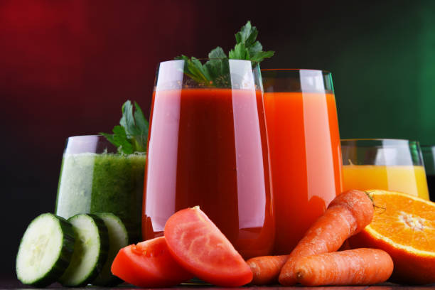 istock Glasses with fresh organic vegetable and fruit juices 1133790185