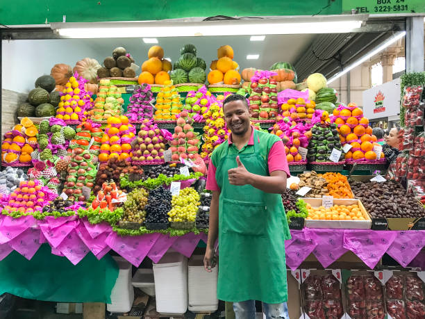 Sao Paulo, Brasil - July 18, 2018: Fruit's market Vendor at Central Market in Sao Paulo, Brazil.