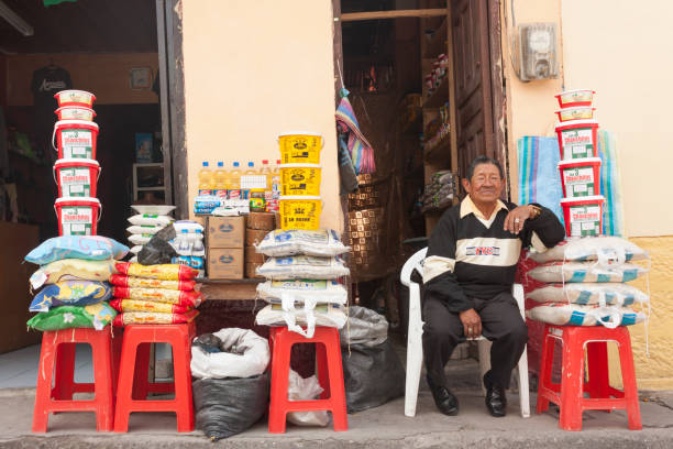 Alausí, Ecuador - June 4, 2018: Market Vendor at Central Market in Alausí, Ecuador.