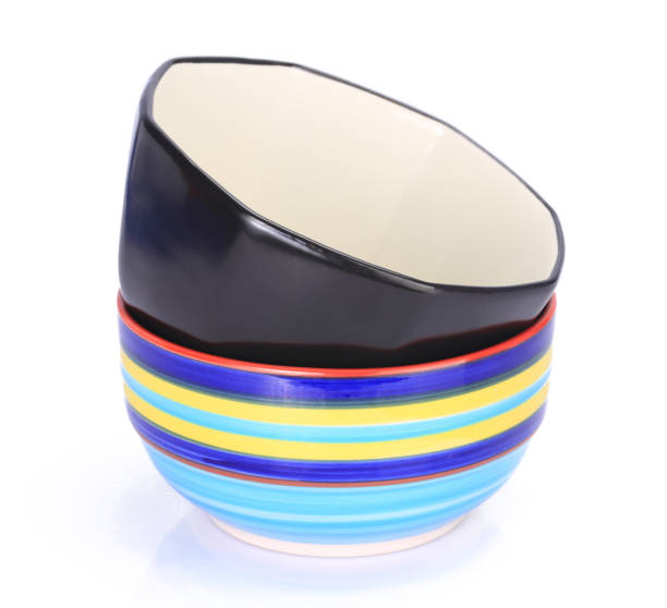 istock Colorful and black ceramic bowl on a white background 1133795089