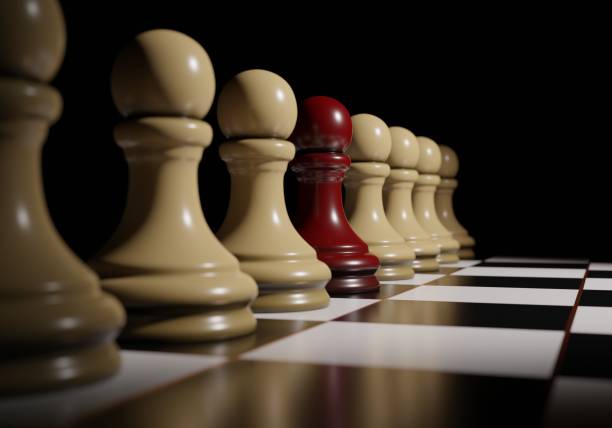 istock A Row of Chess Pawns With One Odd One 1133795791