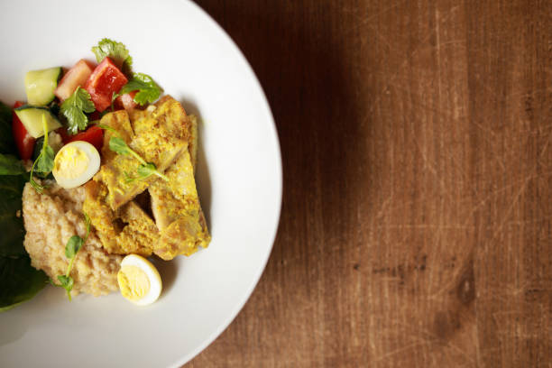 istock Chicken curry with salad in the plate, top view 1133800779