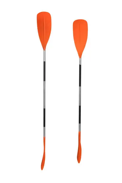 Photo of orange paddle for kayak isolated on white background