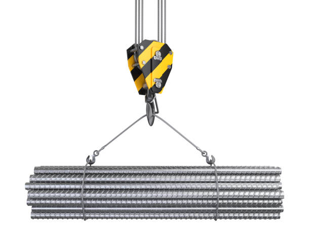 istock Crane hook hanging on a steel ropes with big steel reinforcement pack. 1133804484