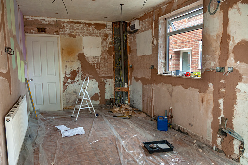 Chaotic scene inside a house undergoing kitchen refurbishment at the preparation stage of the building work.
