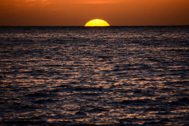 istock The  Sun Setting in the Sea 1133806793