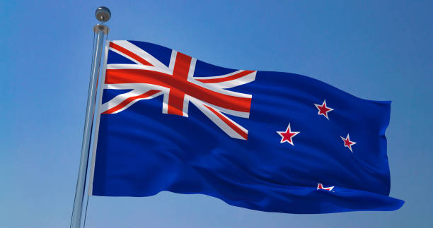 drapeau de la nouvelle-zélande flottant. illustration 3d du drapeau nz. union jack. océanie. - zeeland photos et images de collection
