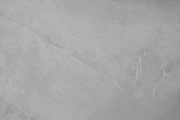 istock Old Gray Cement Wall Background, White Concrete Texture. Stucco vintage surface black and white. Universal template for your design 1133810138
