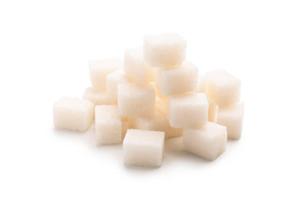 istock Heap of sugar cubes isolated on white background 1133810303