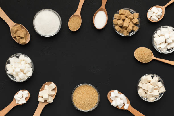 istock Various types of sugar on black background. 1133810307