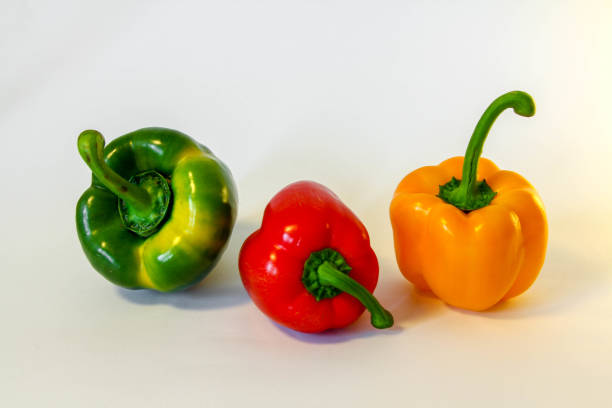 istock Three isolated fresh colorful peppers 1133811309