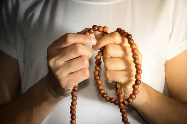 istock Necklace in hand,religion concept. 1133814988
