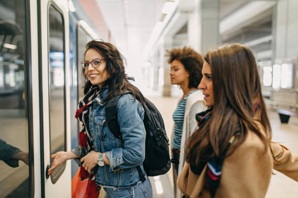 istock Three friends with suitcases travel together 1133818899