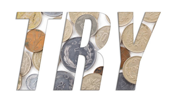 istock TRY (Turkish Lira) symbol with stack of old Turkish coins on white background 1133819695