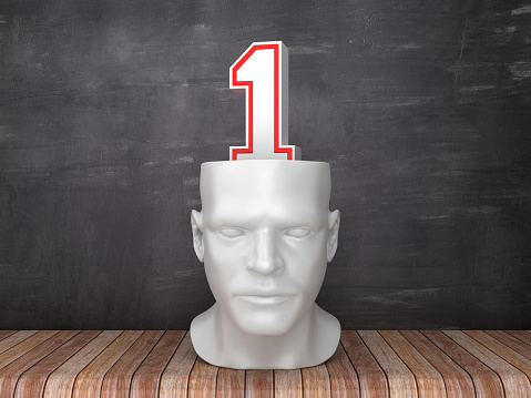 Human Head with Number 1 on Chalkboard Background - 3D Rendering