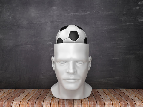 Human Head with Soccer Ball on Chalkboard Background - 3D Rendering